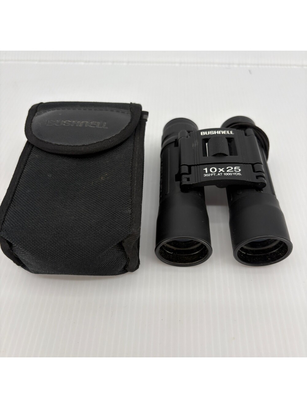 Bushnell 10x25 Compact Binoculars 302 Ft At 1000 Yds Black With Case Strap